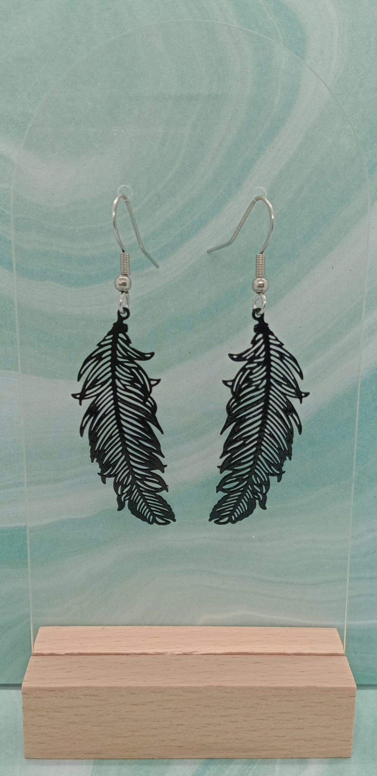 Black feather earrings